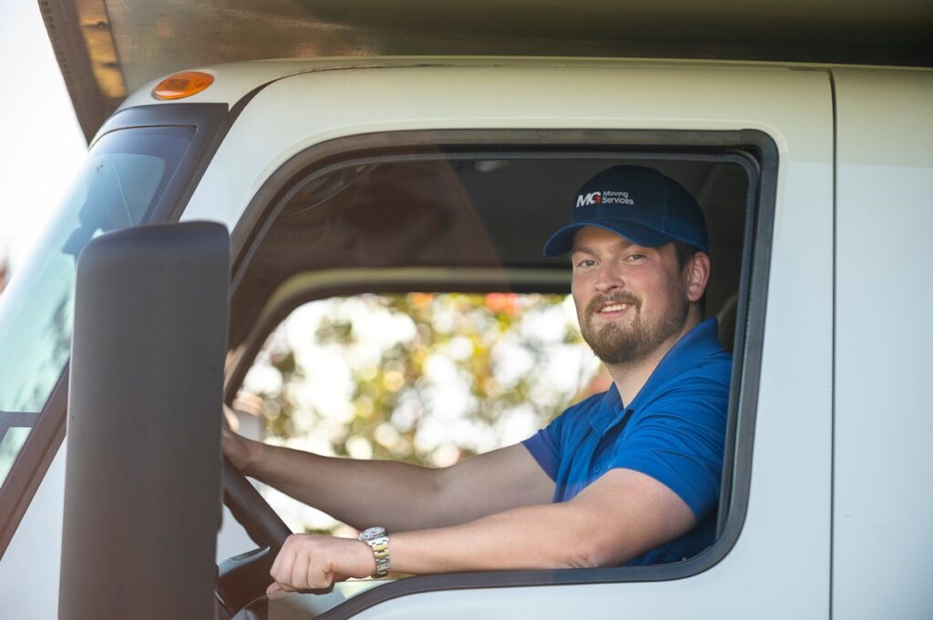 mg moving truck driver