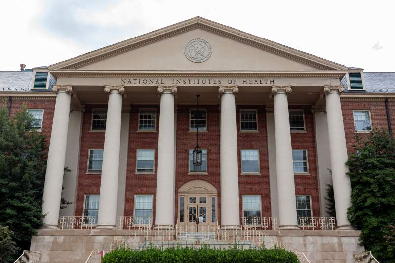 The main historical building (Building 1) of the National Institutes of Health (NIH) inside Bethesda campus. U.S. Public Health Service seal is seen on top of it