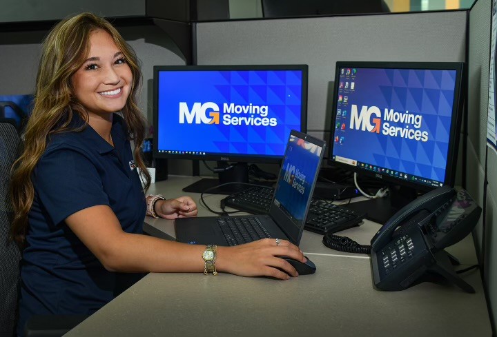 MG Moving staff in front desk
