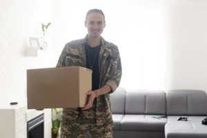 military man with a box